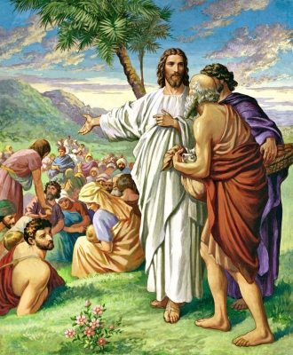 Jésus multiplie les pains et les poissons.